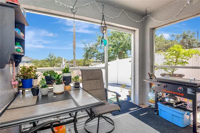 a room with furniture and a window