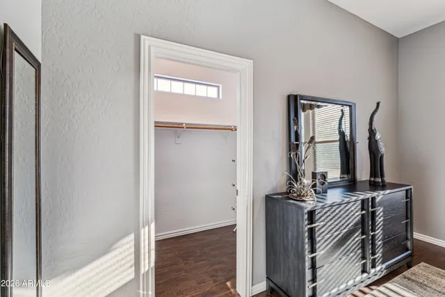 a view of a porch with furniture and a yard