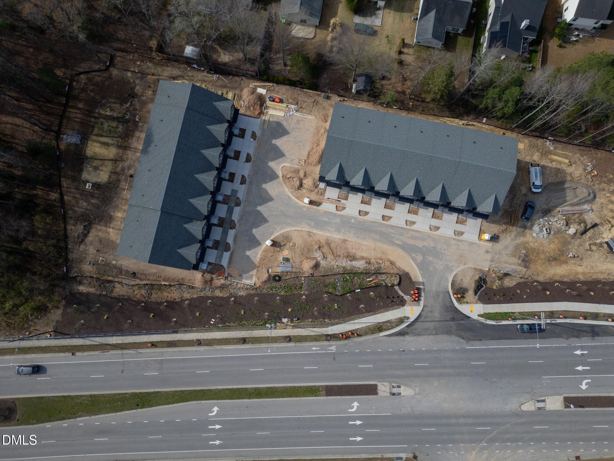 3814 Granite Mill Way Raleigh, NC 27616 - Photo 28 of 48 an aerial view of a house with a yard and garage