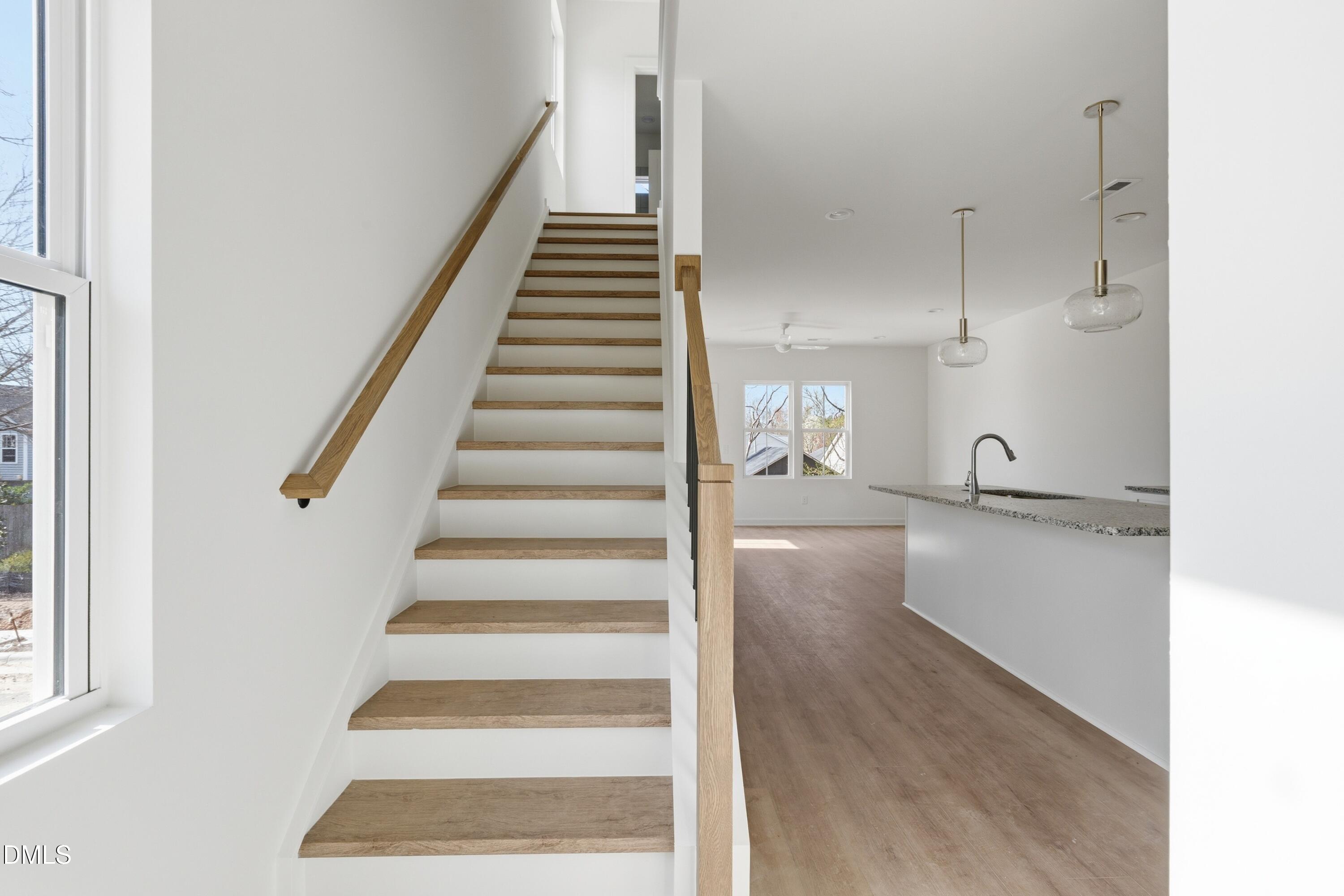 3814 Granite Mill Way Raleigh, NC 27616 - Photo 7 of 48 a view of entryway and hall with wooden floor