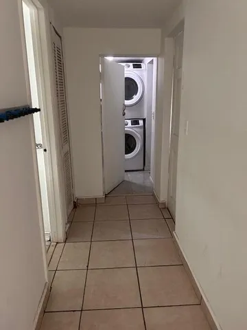 a refrigerator freezer sitting inside of a kitchen
