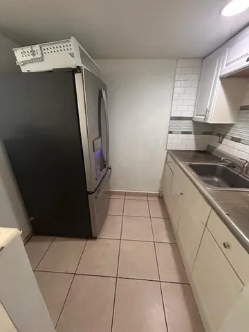 a refrigerator in a kitchen