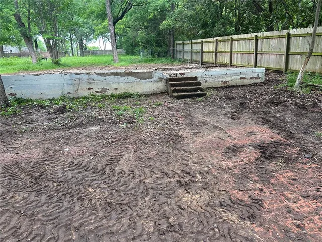 a house view with a backyard space