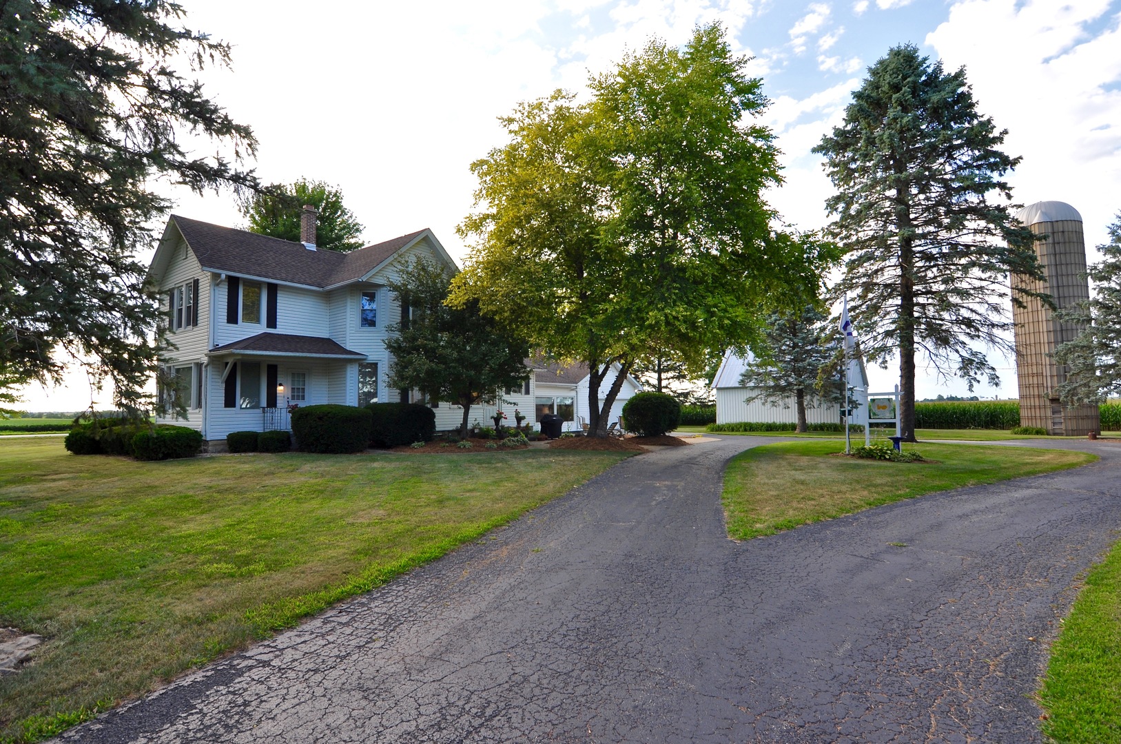 16053 Owens Road Hinckley, IL 60520 - Photo 13 of 68 a view of a house with a yard