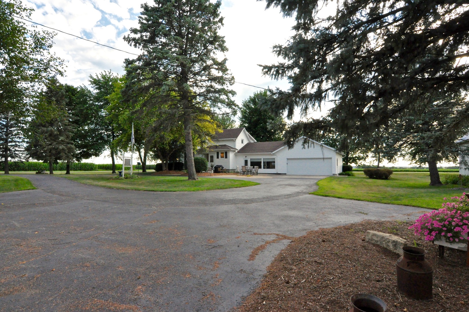 16053 Owens Road Hinckley, IL 60520 - Photo 24 of 68 a house with trees in front of it
