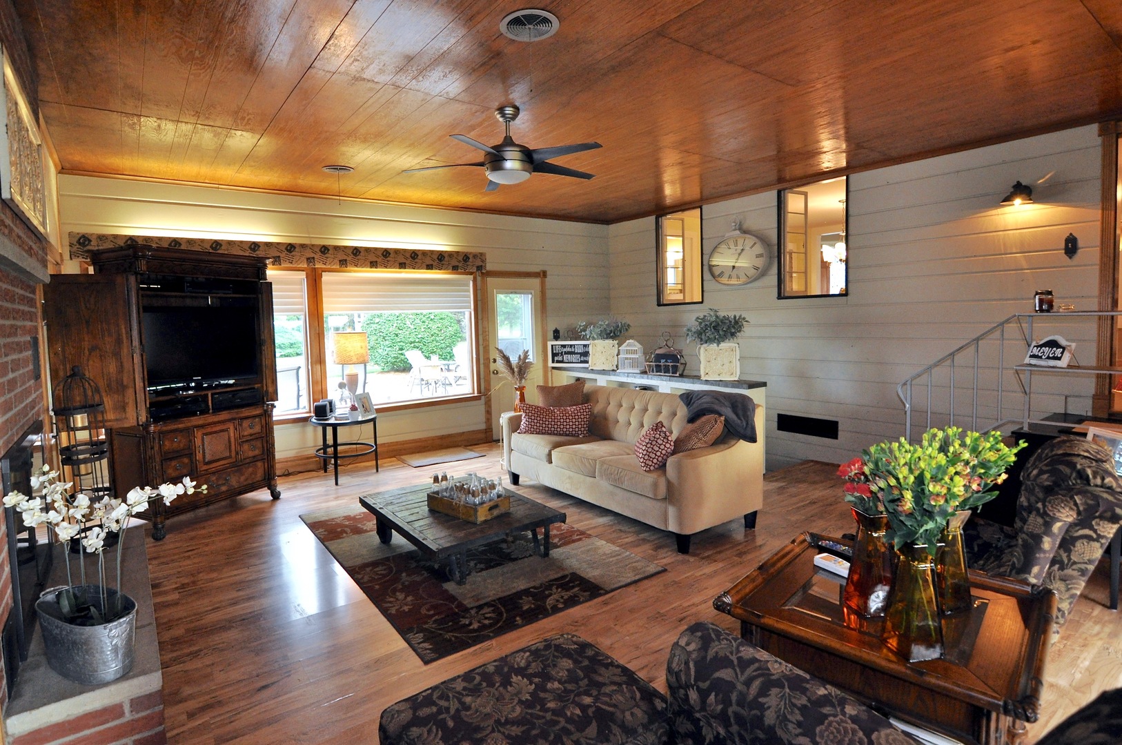 16053 Owens Road Hinckley, IL 60520 - Photo 28 of 68 a living room with furniture and a flat screen tv