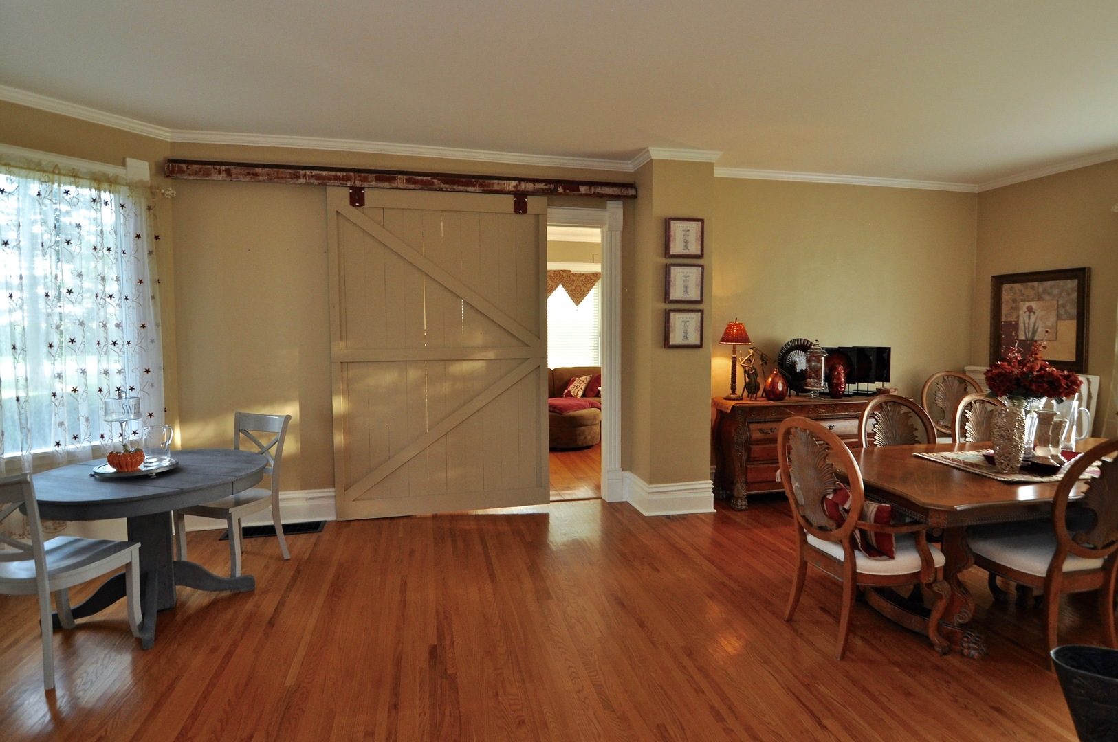 16053 Owens Road Hinckley, IL 60520 - Photo 39 of 68 a view of a dining room with furniture and wooden floor
