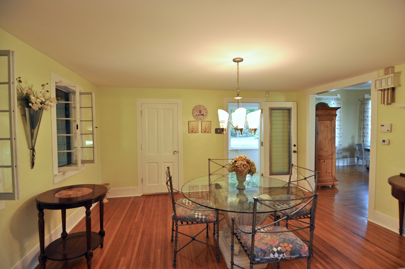 16053 Owens Road Hinckley, IL 60520 - Photo 41 of 68 a view of a dining room with furniture and wooden floor