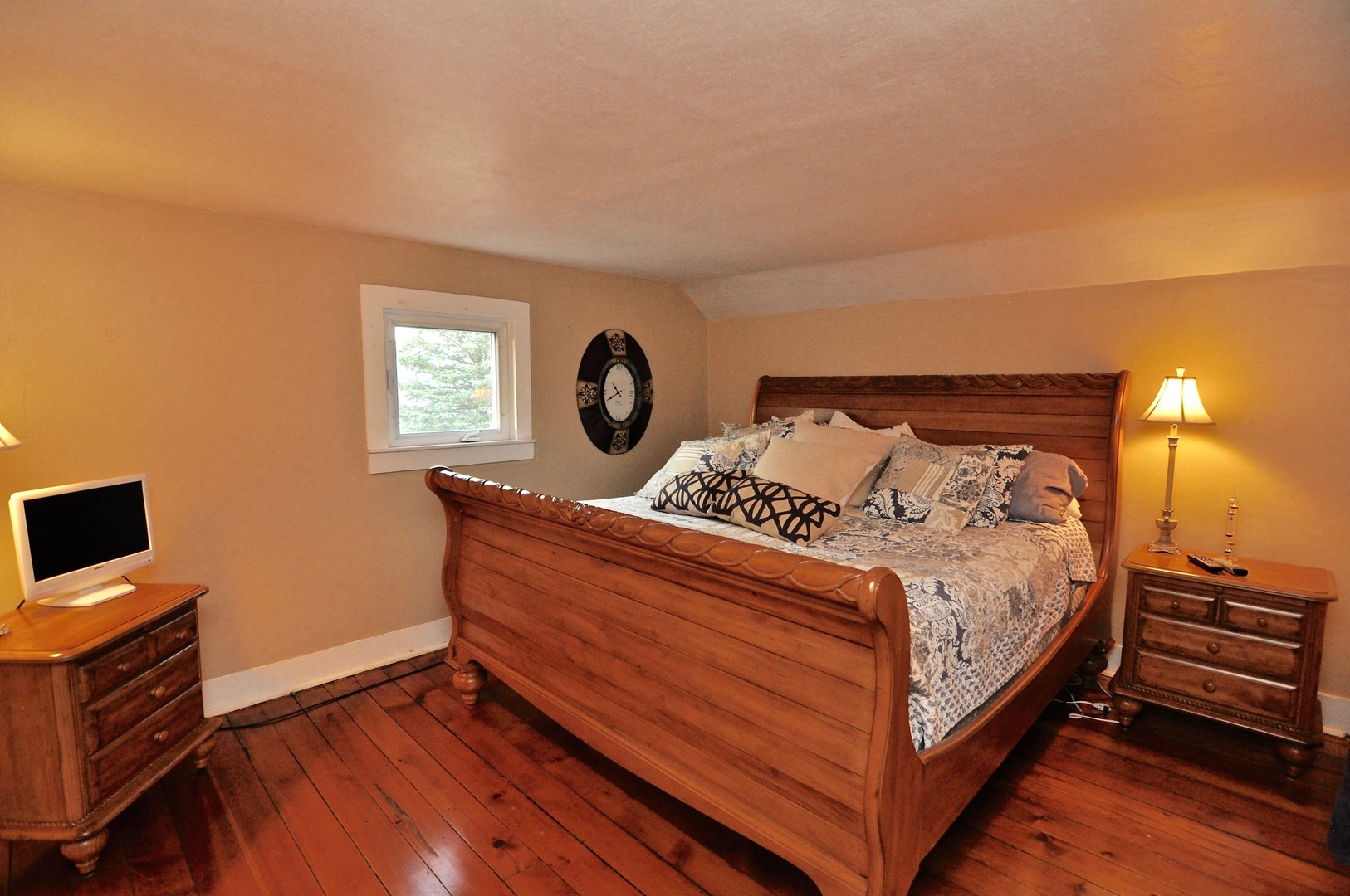 16053 Owens Road Hinckley, IL 60520 - Photo 53 of 68 a bed room with a bed and a tv