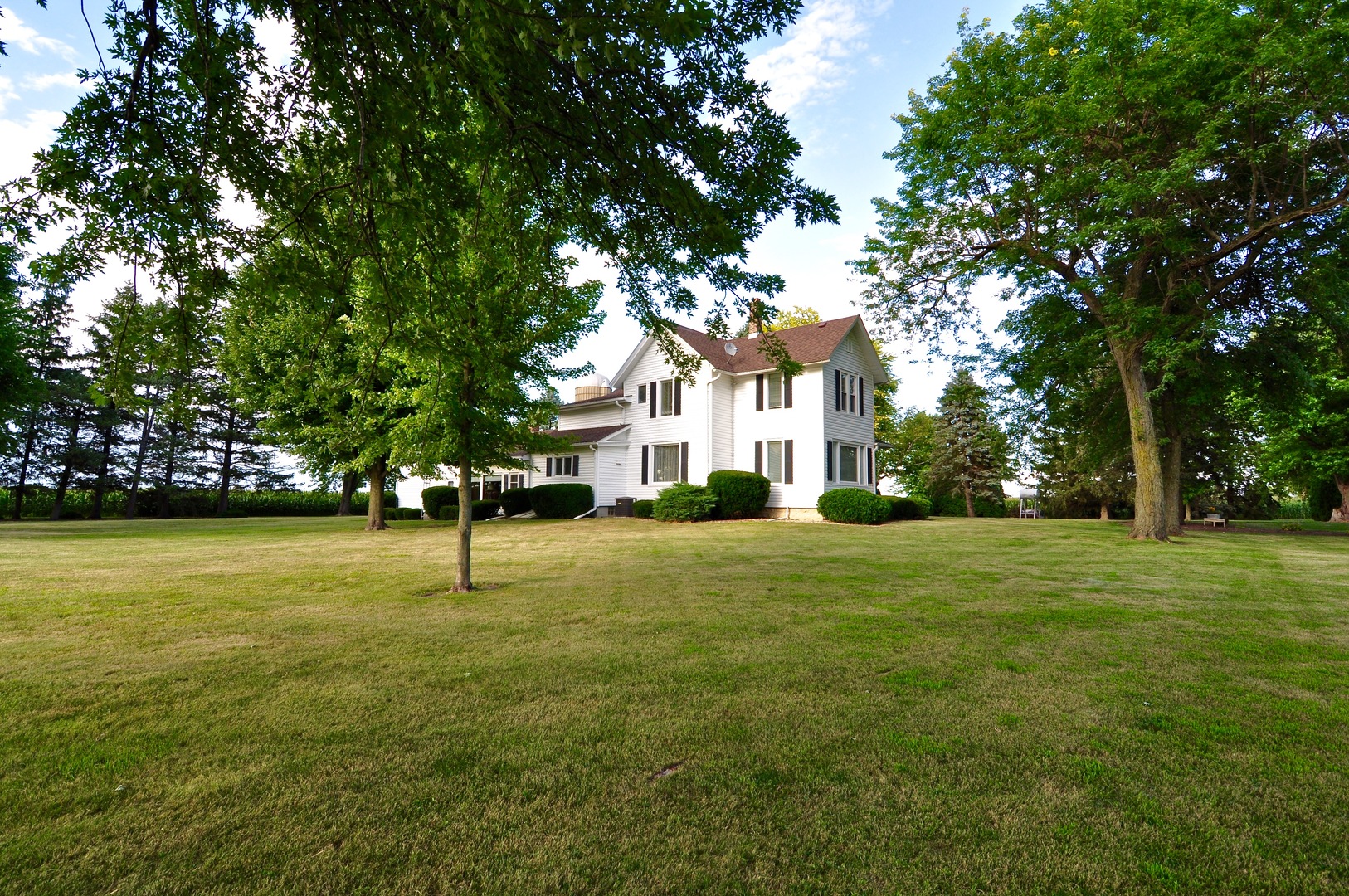 16053 Owens Road Hinckley, IL 60520 - Photo 6 of 68 a front view of a house with a yard