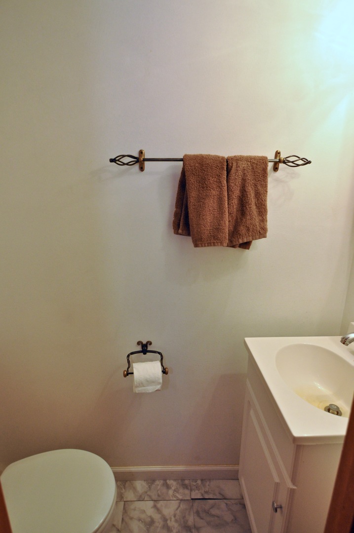 16053 Owens Road Hinckley, IL 60520 - Photo 61 of 68 a bathroom with a sink and a mirror