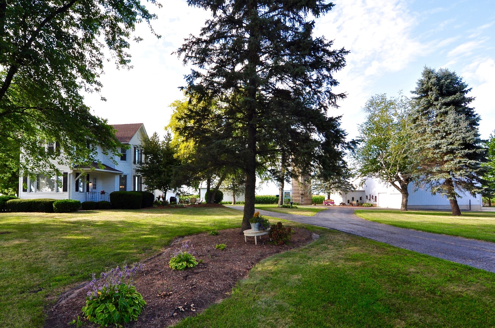 16053 Owens Road Hinckley, IL 60520 - Photo 63 of 68 a view of a park with large trees