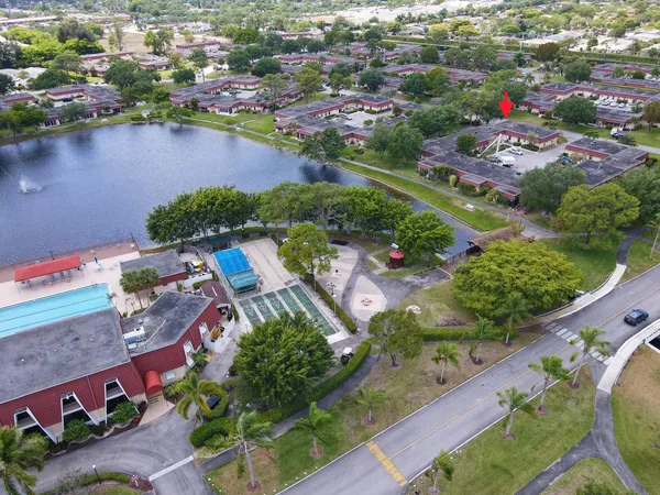 an aerial view of a city and lake view