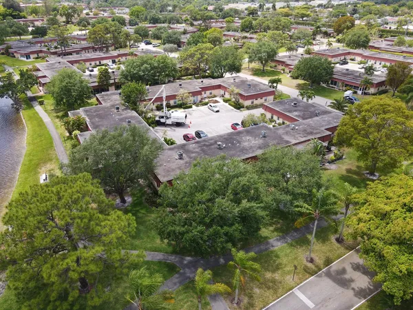 an aerial view of a houses with outdoor space