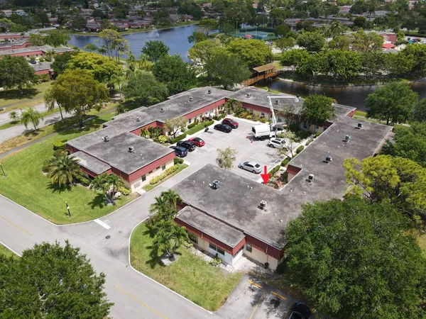 an aerial view of house with yard