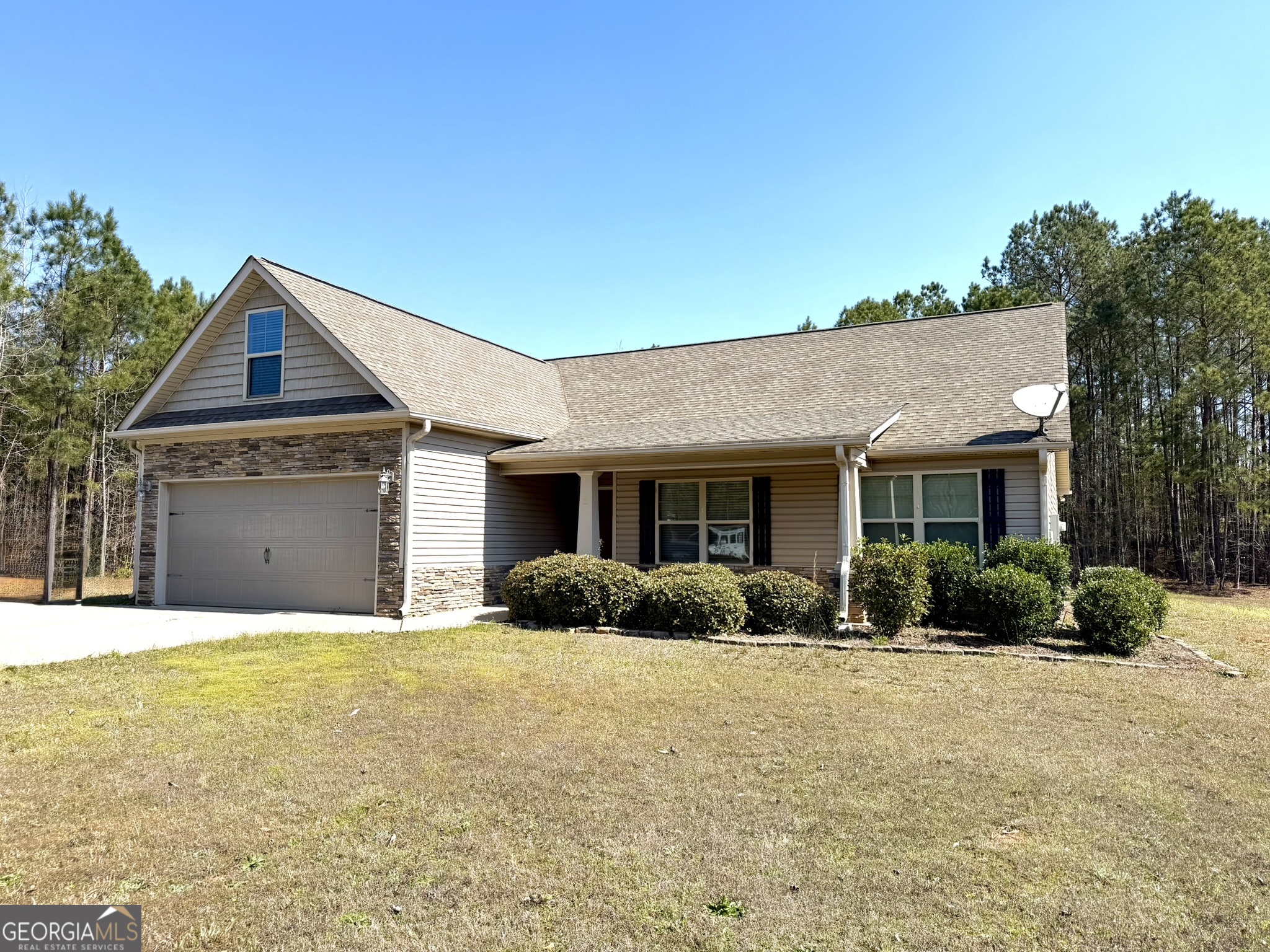 111 Bridle Path Griffin, GA 30224 - Photo 1 of 20 a front view of a house with a yard