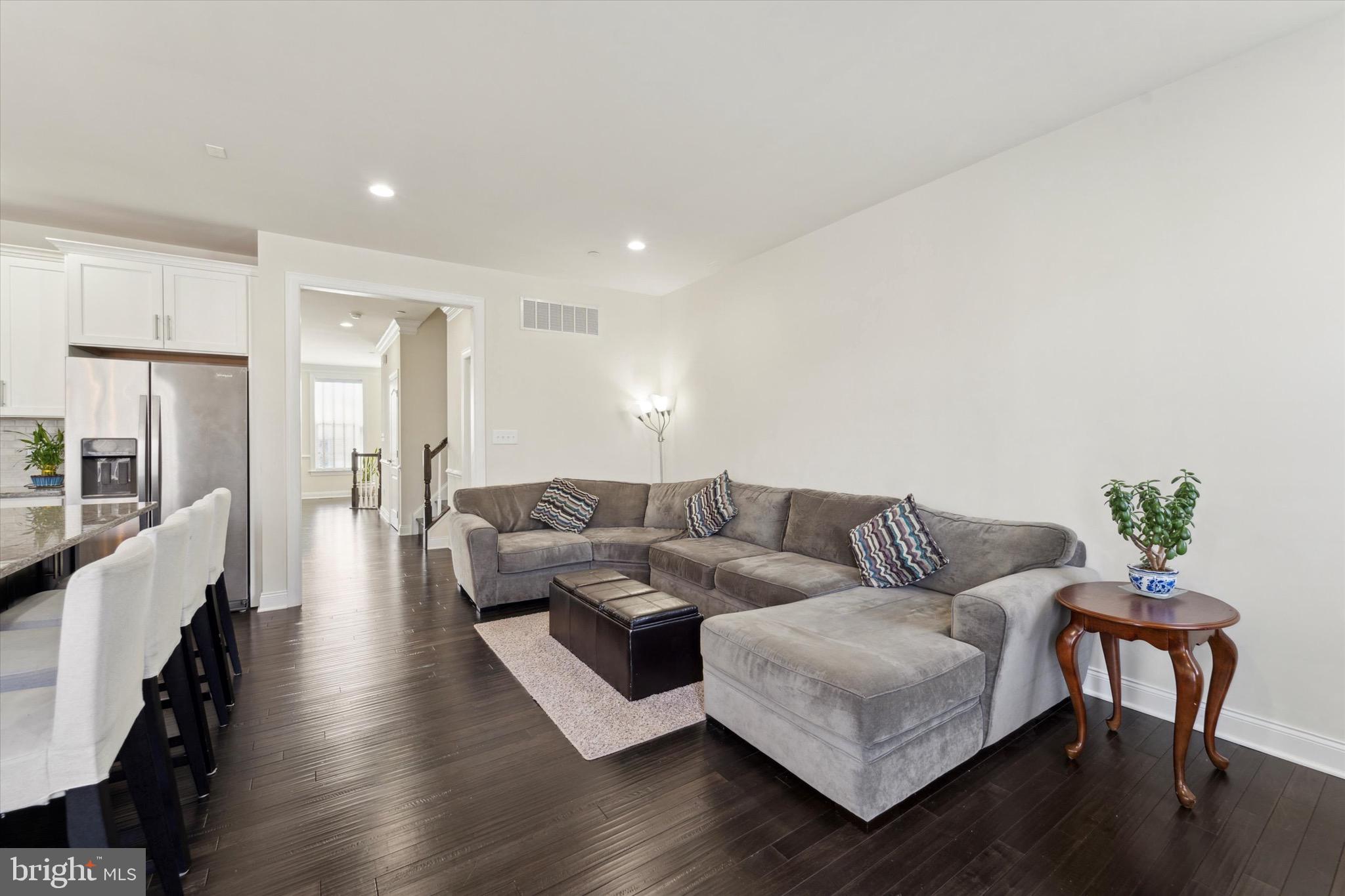 311 Corvus Circle Springfield, PA 19064 - Photo 12 of 51 a living room with furniture and a wooden floor