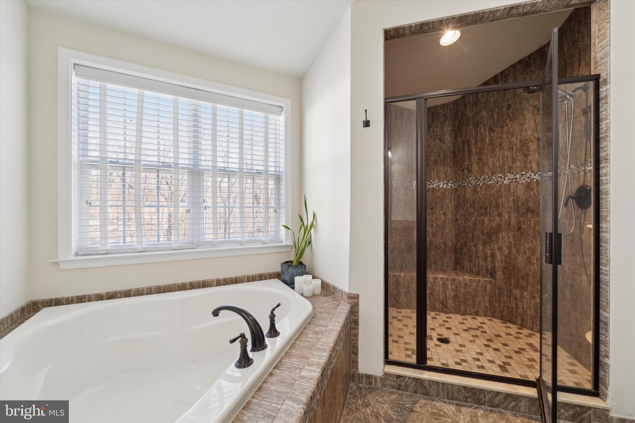 311 Corvus Circle Springfield, PA 19064 - Photo 27 of 51 a bathroom with a bathtub and a shower