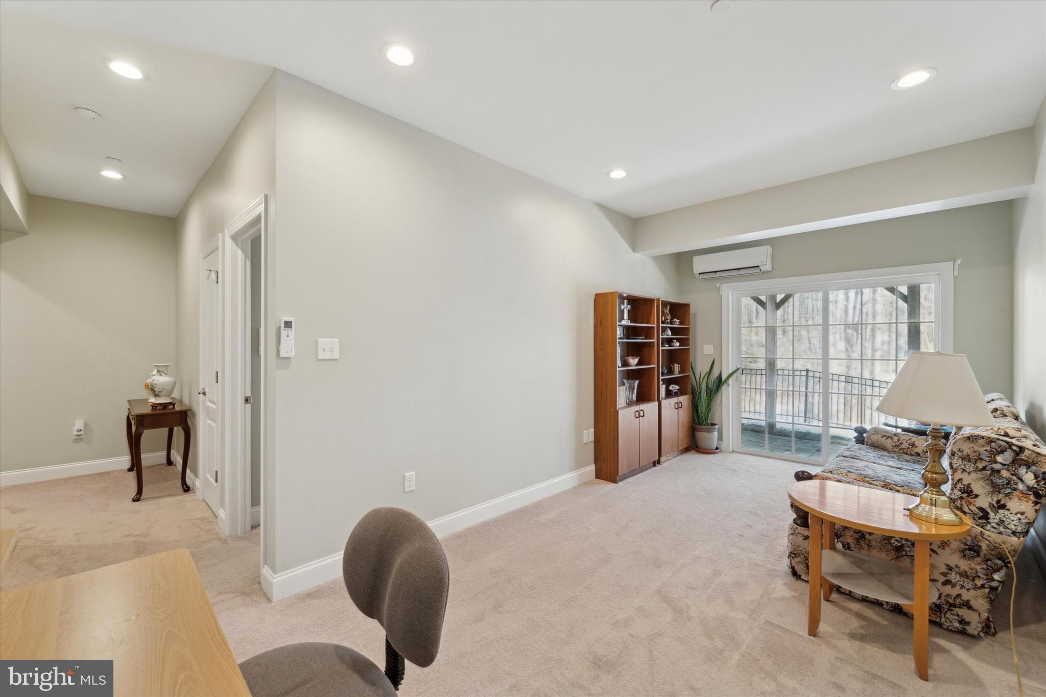 311 Corvus Circle Springfield, PA 19064 - Photo 44 of 51 a living room with furniture and a wooden floor