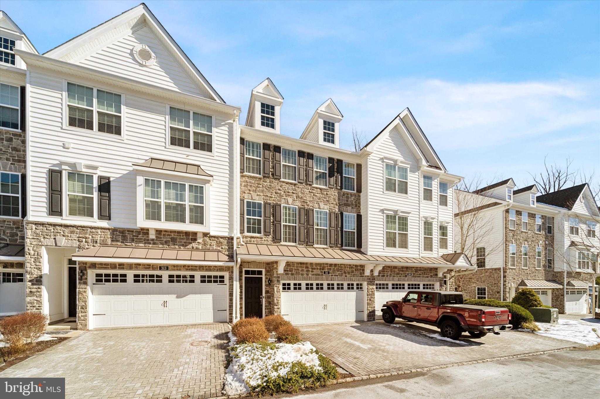 311 Corvus Circle Springfield, PA 19064 - Photo 47 of 51 a building with multiple windows