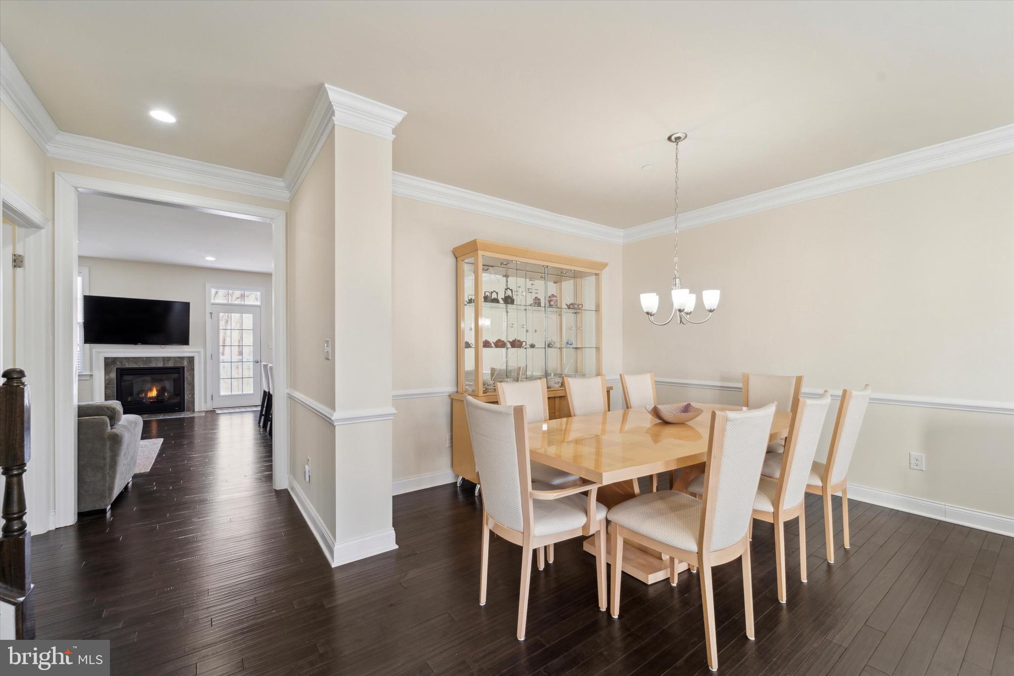 311 Corvus Circle Springfield, PA 19064 - Photo 5 of 51 a view of a dining room with furniture wooden floor and chandelier