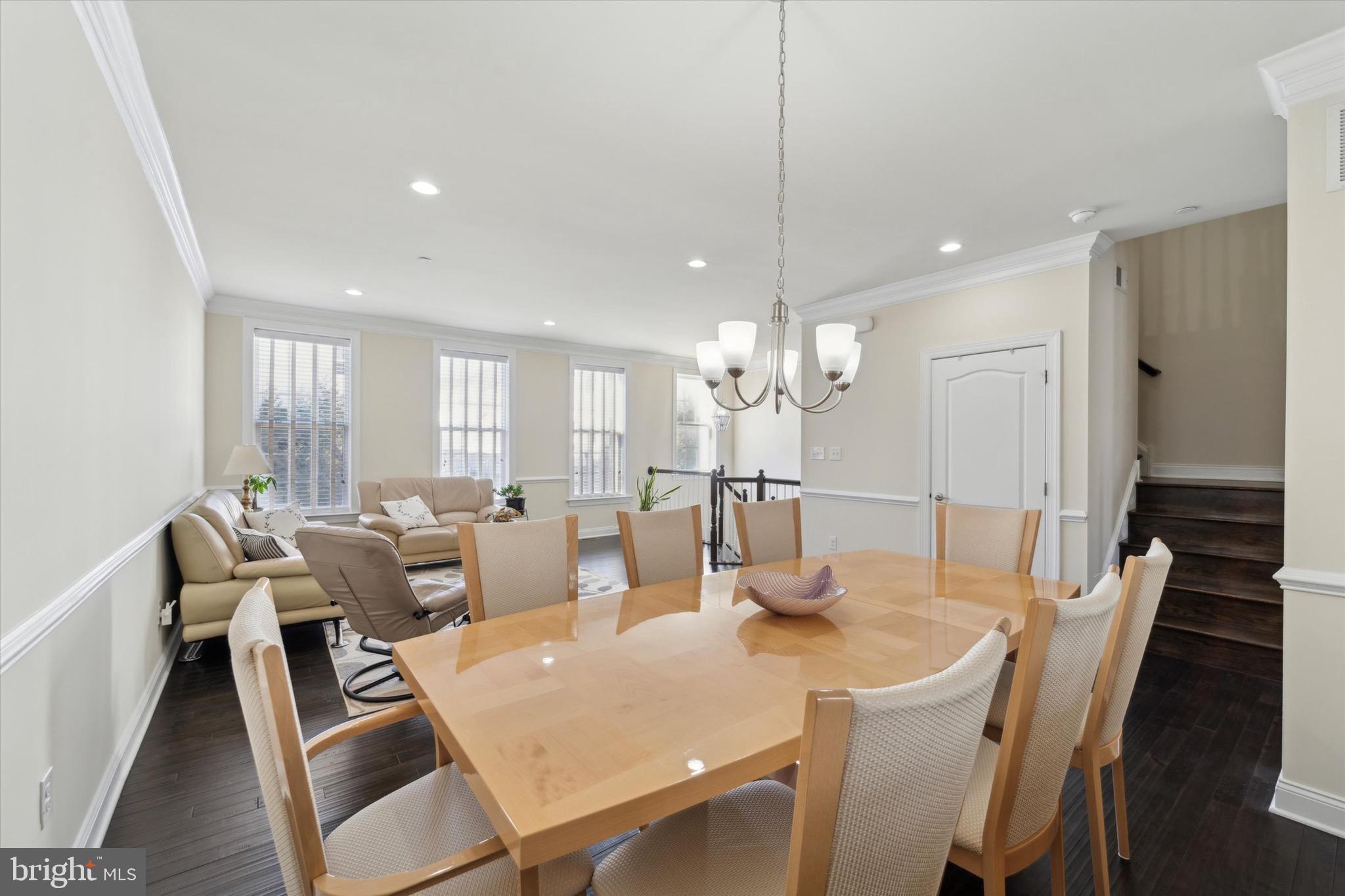311 Corvus Circle Springfield, PA 19064 - Photo 7 of 51 a view of a dining room with furniture window and wooden floor