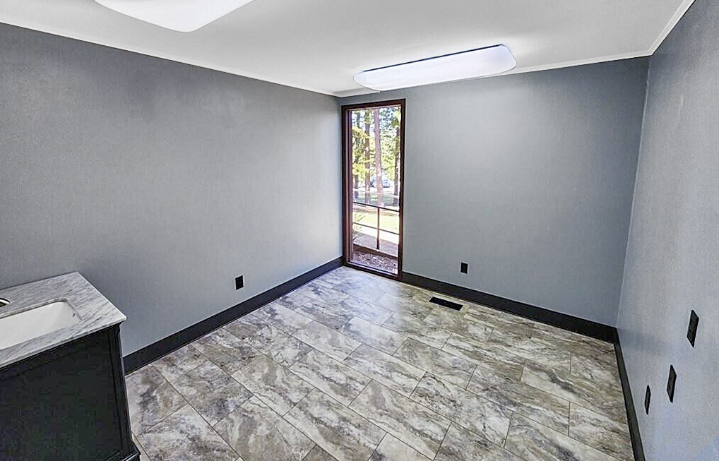 395 River Road Decatur, TN 37322 - Photo 6 of 11 a view of an empty room and window