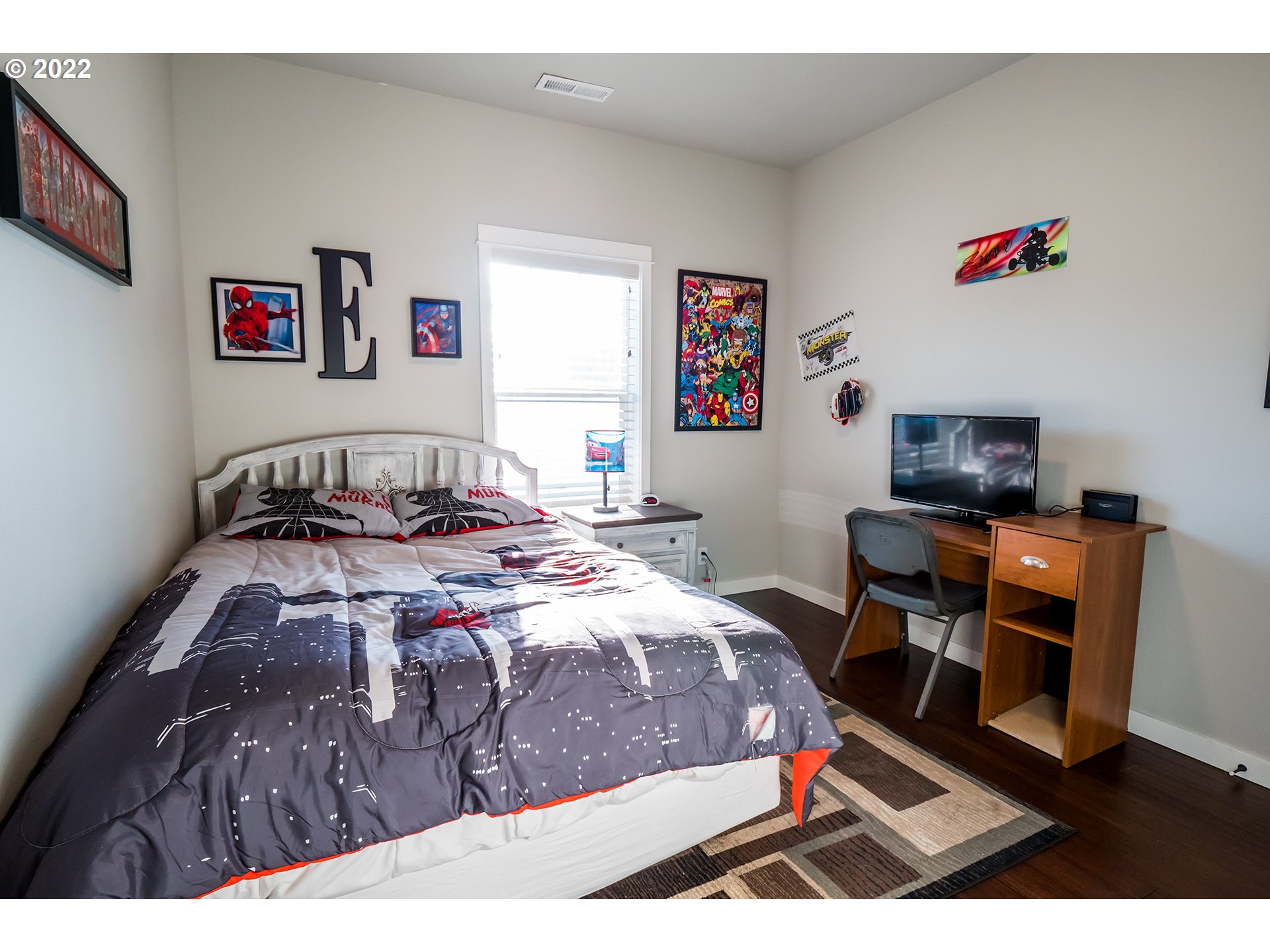 203 Ash Street Springfield, OR 97477 - Photo 14 of 32 a bedroom with a bed and a desk