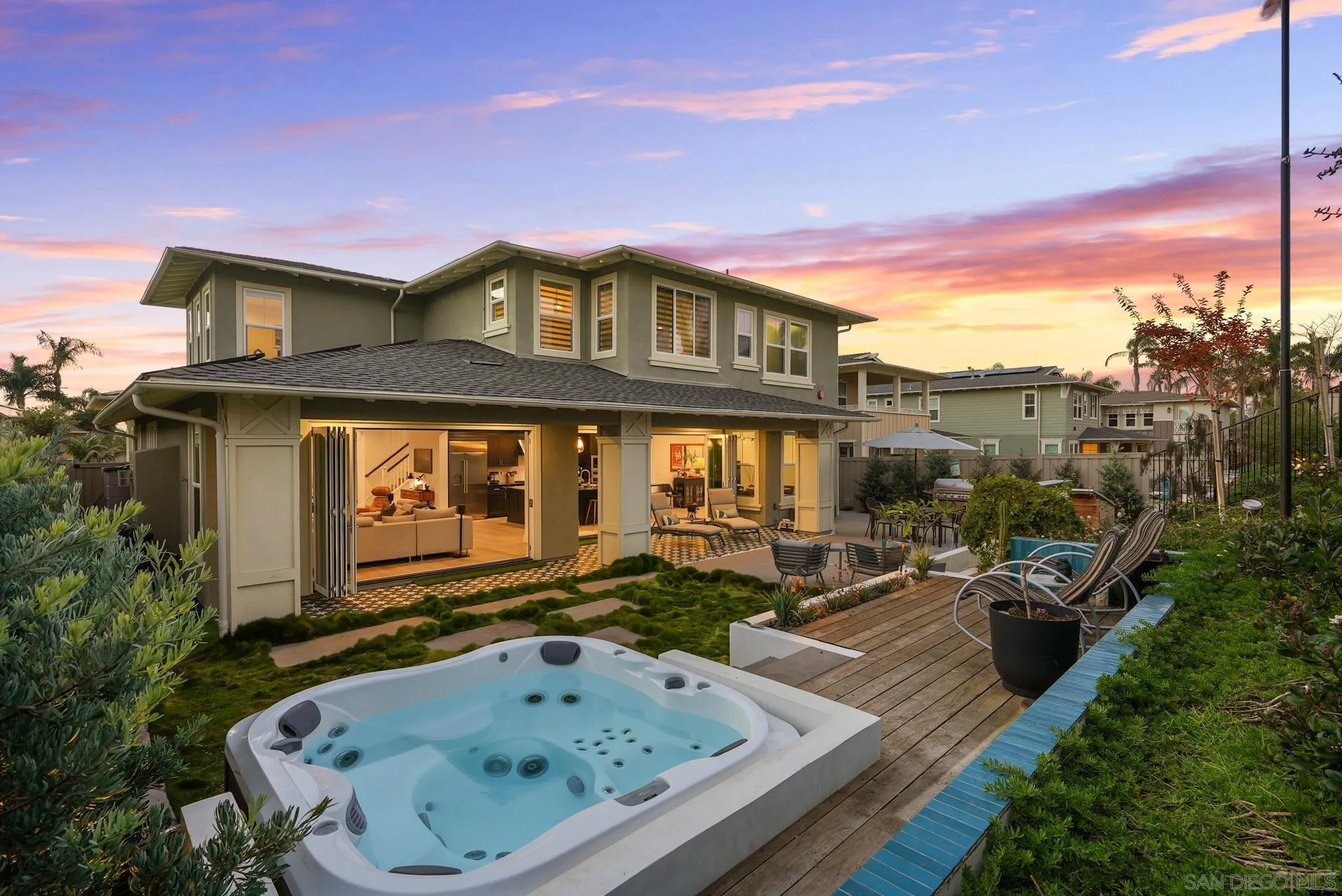 927 Moonstone Court Encinitas, CA 92024 - Photo 2 of 31 a front view of a house with garden