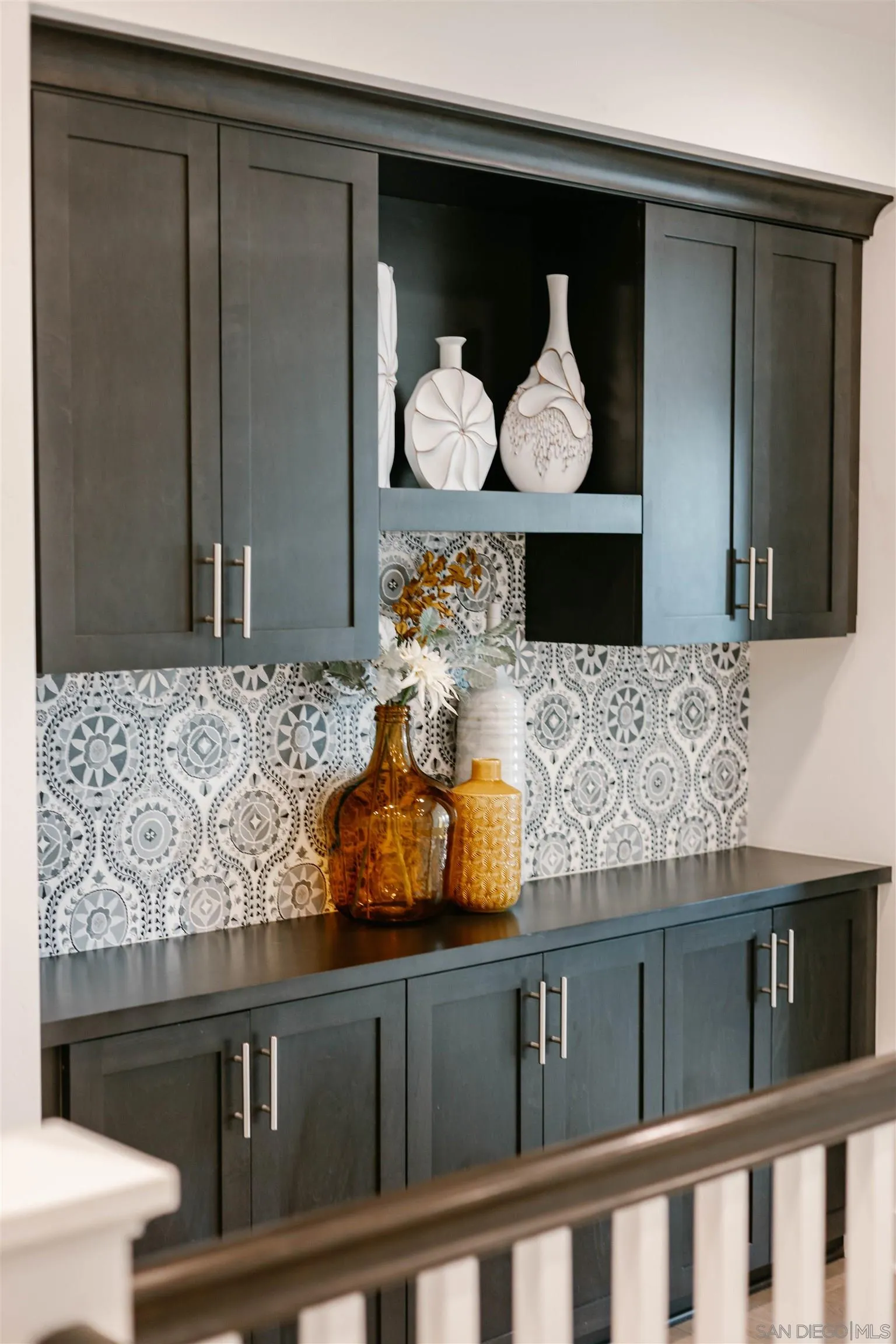 927 Moonstone Court Encinitas, CA 92024 - Photo 25 of 31 a bathroom with a sink and a mirror