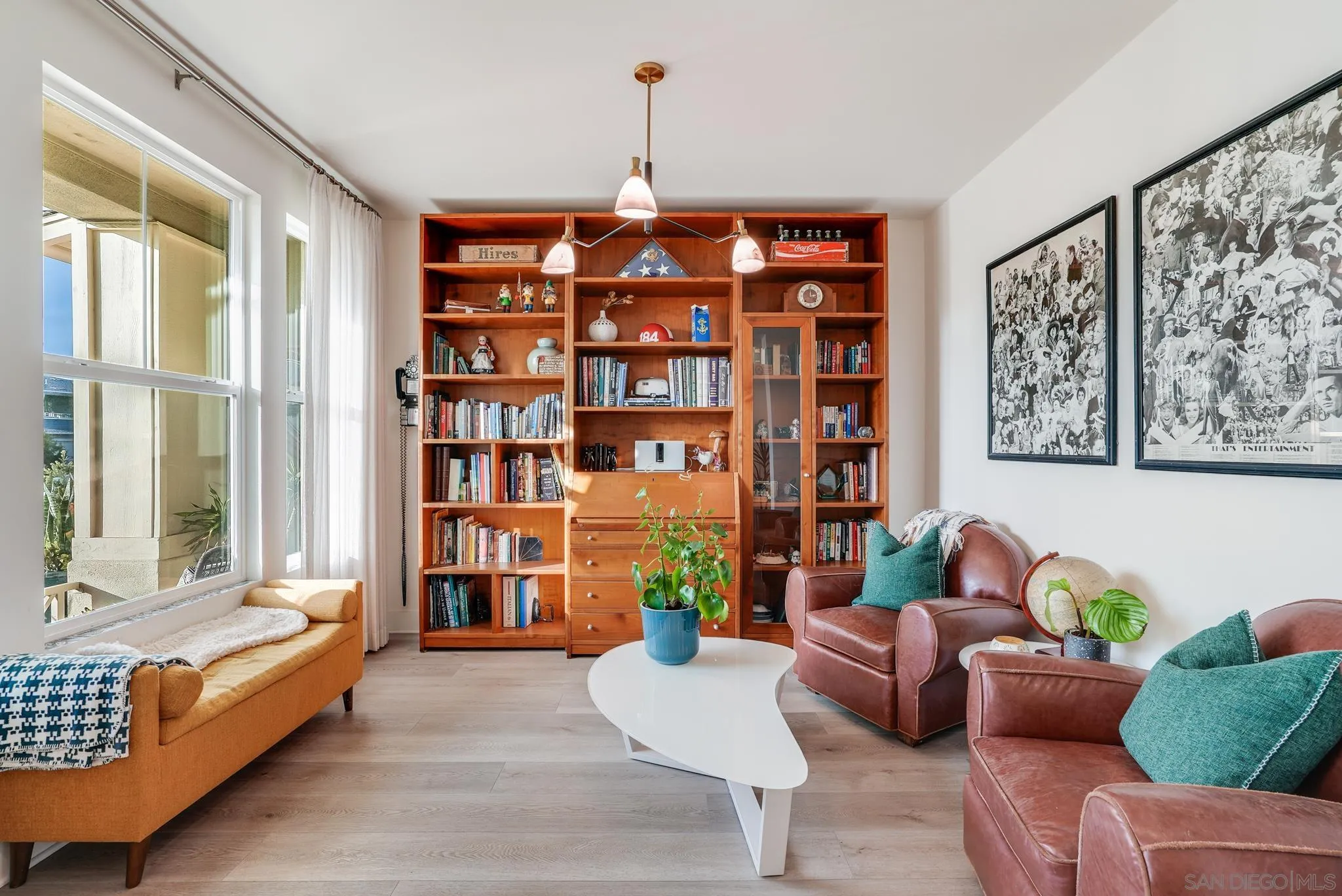 927 Moonstone Court Encinitas, CA 92024 - Photo 4 of 31 a living room with furniture cabinets and window