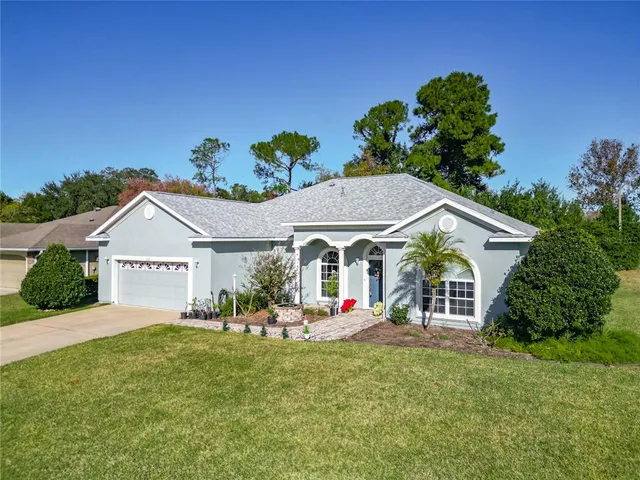 front view of a house with a small yard