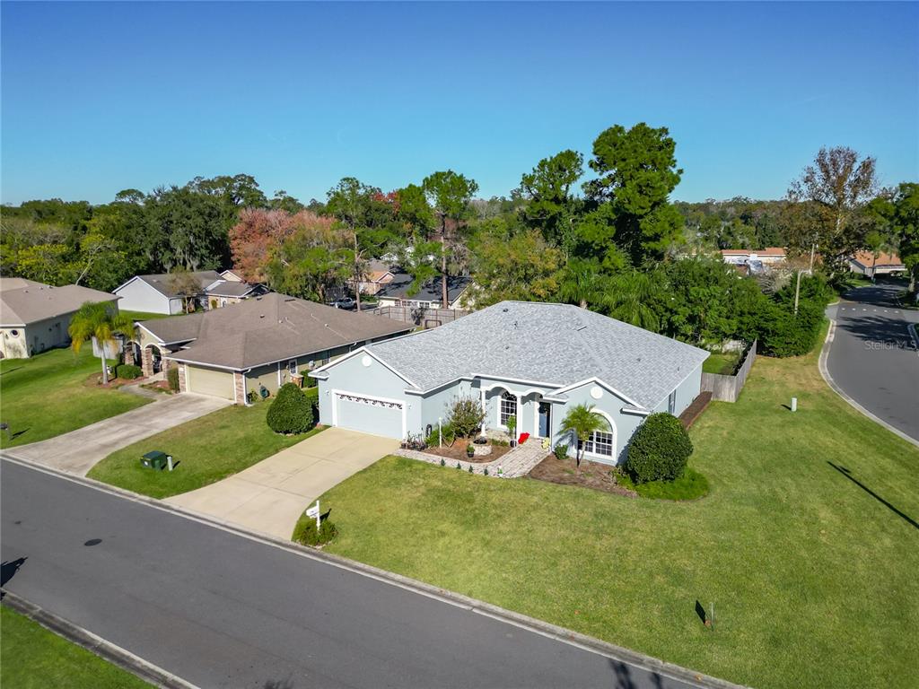 2301 Southeast 22nd Loop Ocala, FL 34471 - Photo 4 of 55 an aerial view of a house with garden space and street view