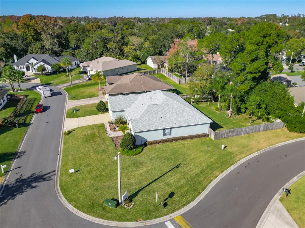 2301 Southeast 22nd Loop Ocala, FL 34471 - Photo 42 of 55 a view of a house with a garden and trees