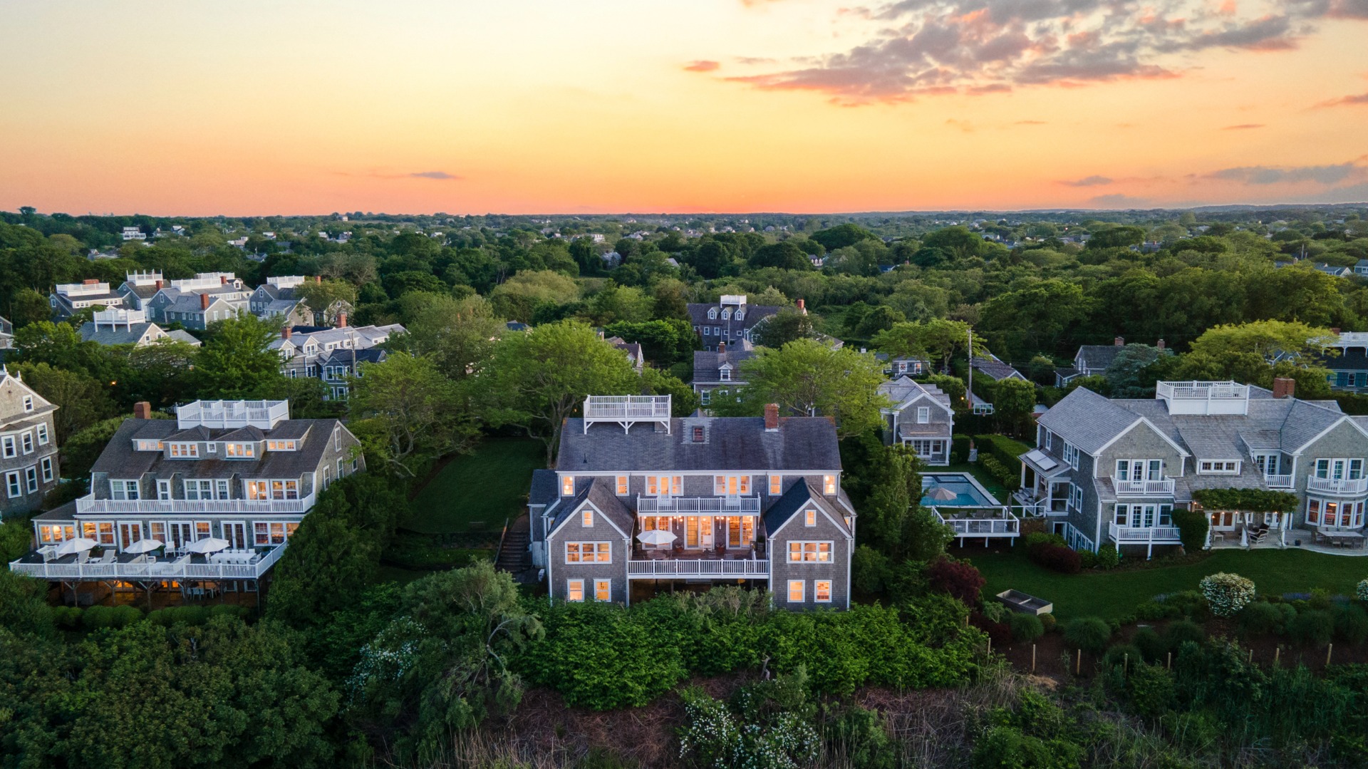33 Cliff Road Nantucket, MA 02554 - Photo 68 of 84 a view of a city with tall buildings and a yard