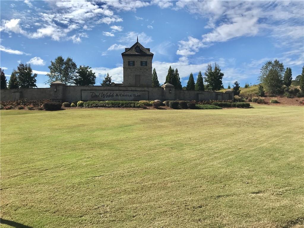 5222 Morrell Road Hoschton, GA 30548 - Photo 23 of 45 a view of a large pool and a yard