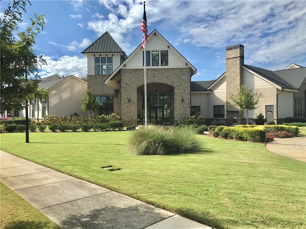 5222 Morrell Road Hoschton, GA 30548 - Photo 26 of 45 a front view of a house with a yard