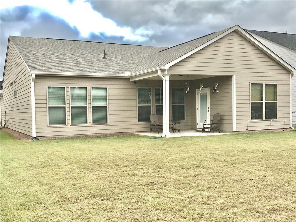 5222 Morrell Road Hoschton, GA 30548 - Photo 42 of 45 a view of a white house with a large window