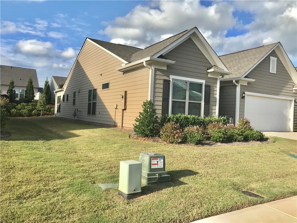5222 Morrell Road Hoschton, GA 30548 - Photo 44 of 45 a front view of a house with garden