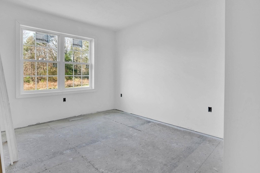 983 Stonegate Landing Dighton, MA 02764 - Photo 14 of 15 an empty room with a window