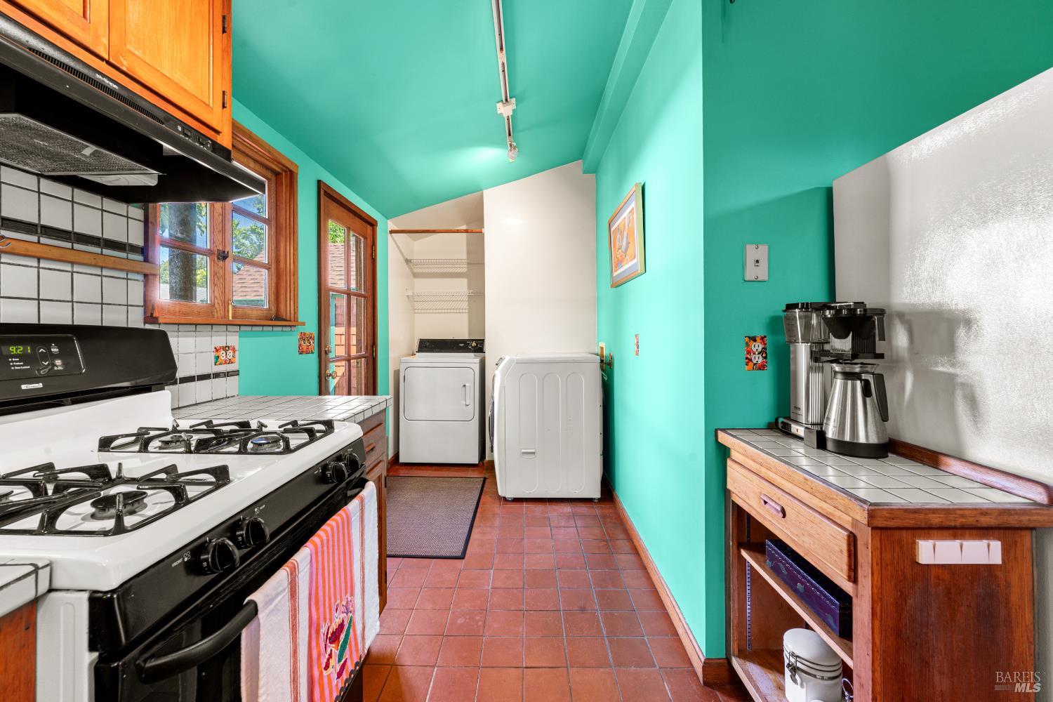 309 Hendley Street Santa Rosa, CA 95404 - Photo 9 of 31 a kitchen with a stove and a sink