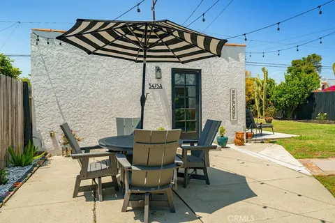 a backyard of a house with seating space