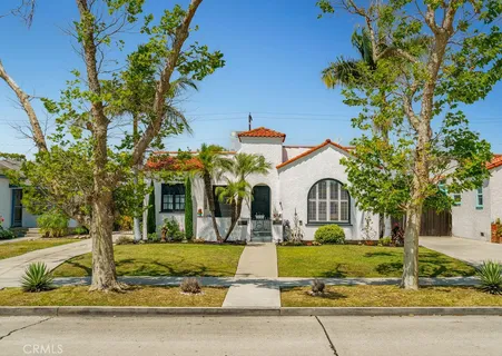 a front view of a house with swimming pool