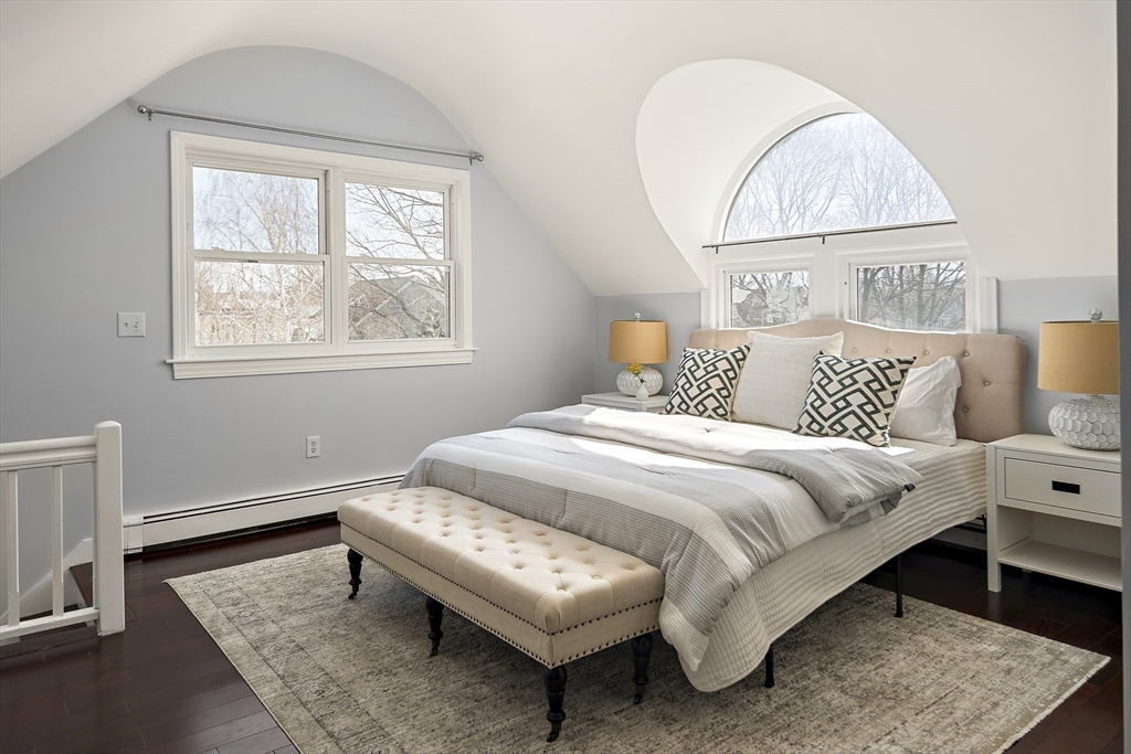 51 Reed Street, Unit 51 Cambridge, MA 02140 - Photo 23 of 27 a bedroom with bed and a window