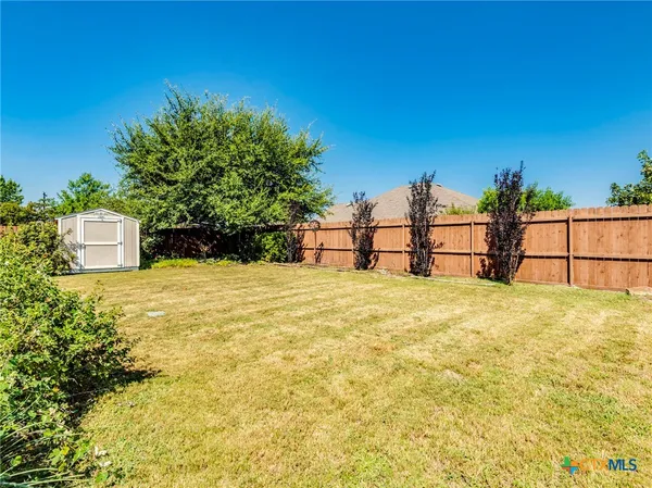 a view of outdoor space and yard