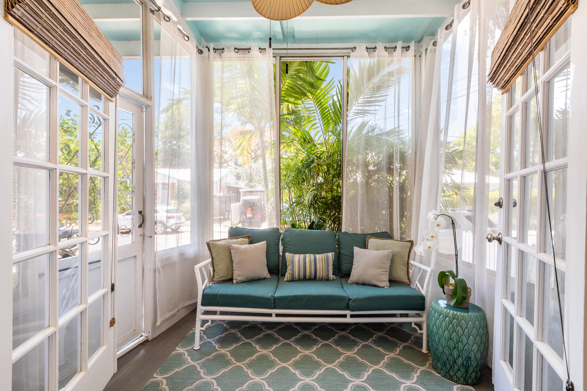 1203 Newton Street, Unit 1 Key West, FL 33040 - Photo 11 of 25 a living room with furniture and a table