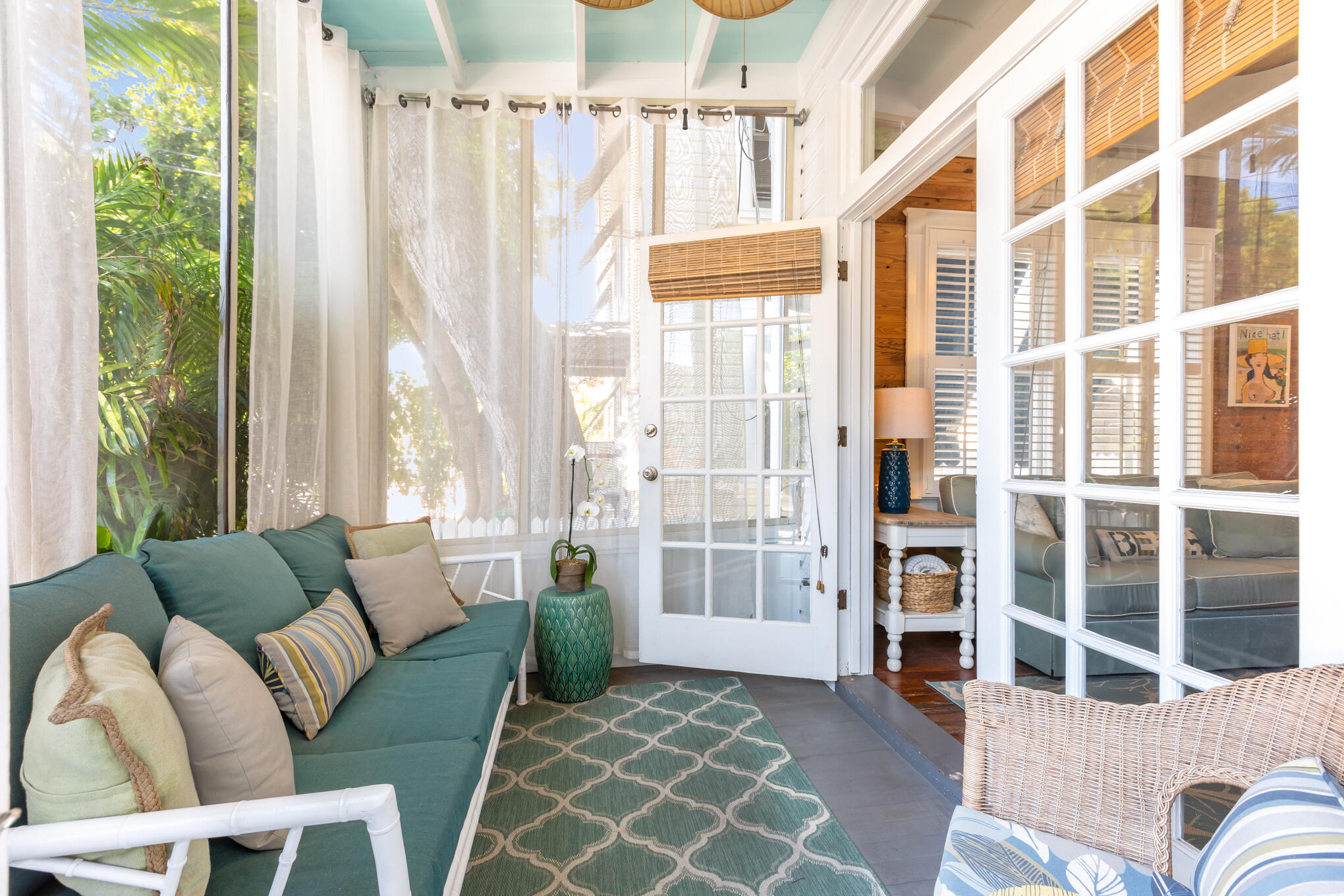 1203 Newton Street, Unit 1 Key West, FL 33040 - Photo 12 of 25 a living room with furniture and a large window