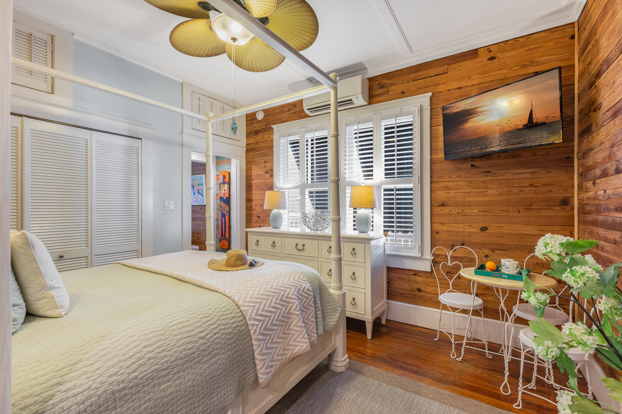 1203 Newton Street, Unit 1 Key West, FL 33040 - Photo 18 of 25 a bedroom with a bed and ceiling fan