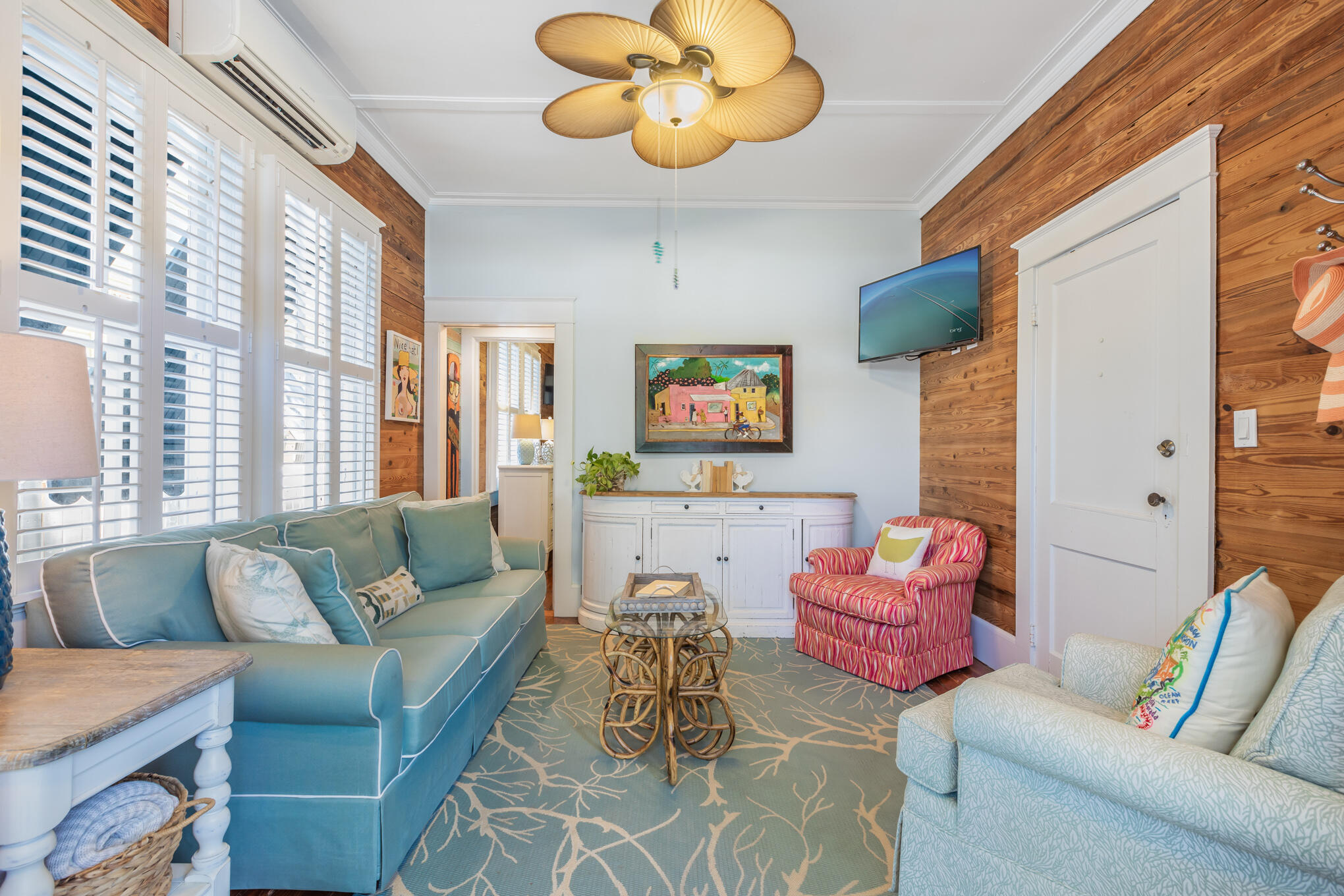 1203 Newton Street, Unit 1 Key West, FL 33040 - Photo 7 of 25 a living room with furniture and a large window