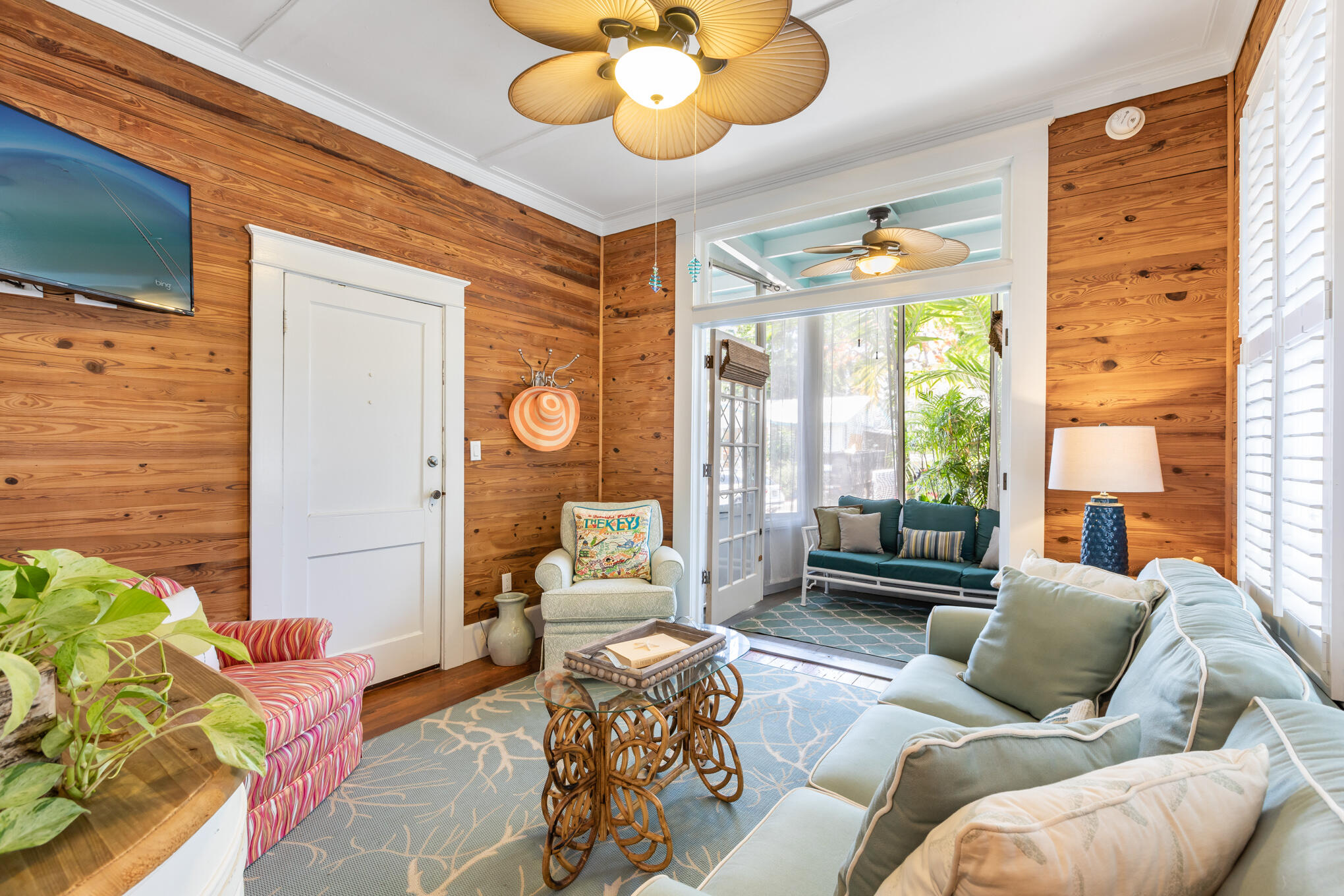 1203 Newton Street, Unit 1 Key West, FL 33040 - Photo 9 of 25 a living room with furniture and a large window